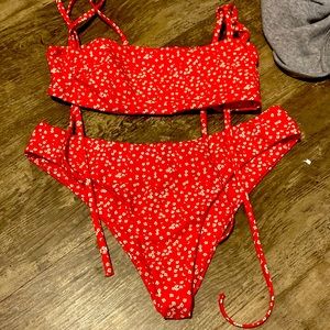 red flower bathing suit barely worn size xs could fit a small